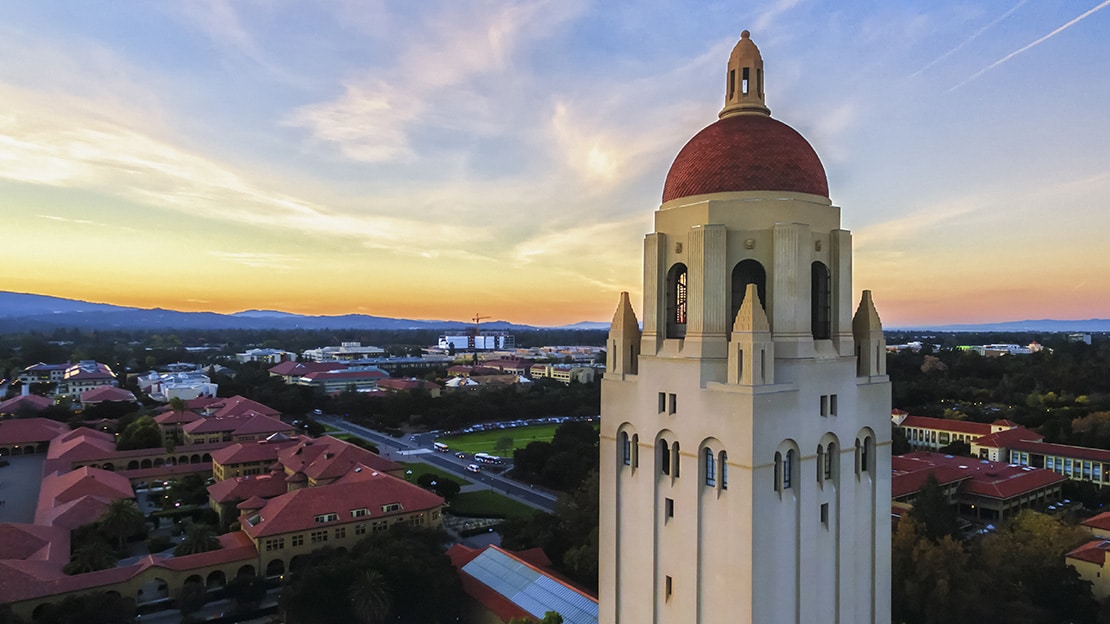 Stanford University campus with iconic architecture and greenery."