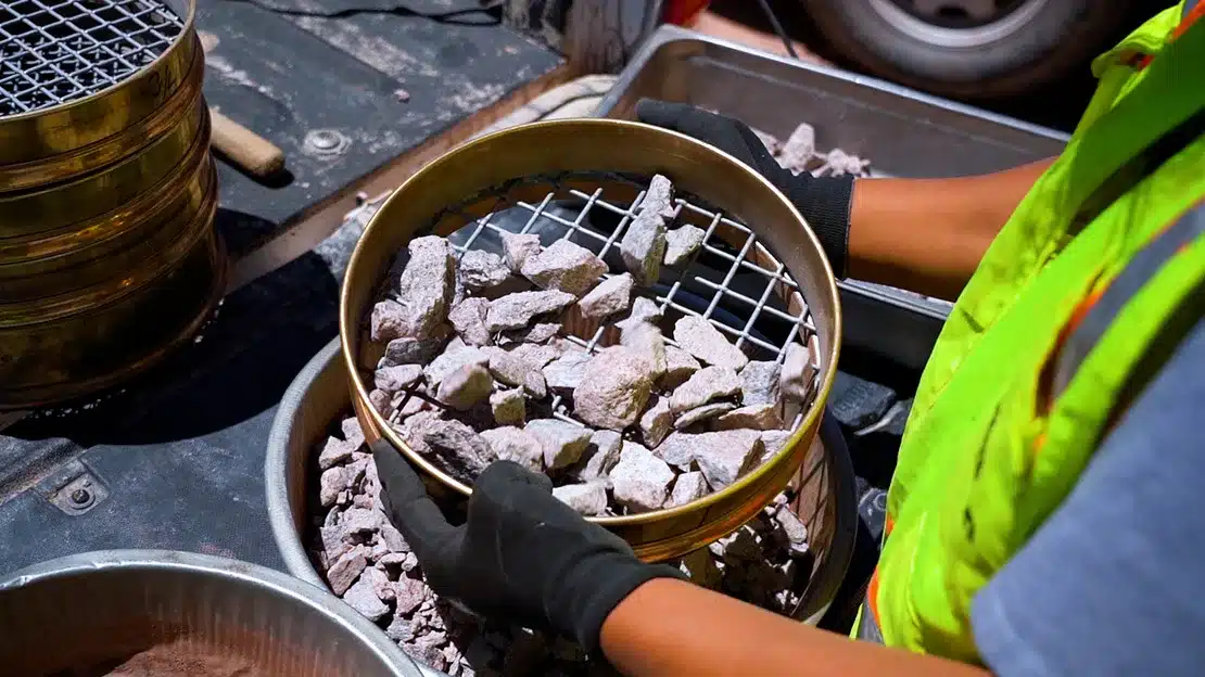 A view of a Terracon technician performing a materials test